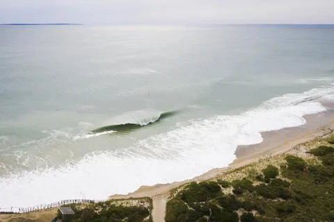 Hurricane Waves eroding a beach in New England Stock Photos