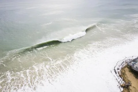 Hurricane Waves eroding a beach in New England Stock Photos