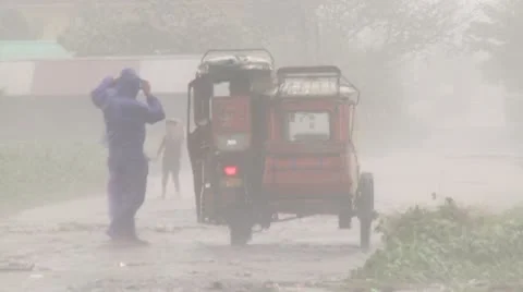 Hurricane Wind And Rain Lashes Man And Vehicle Stock Footage 8998007