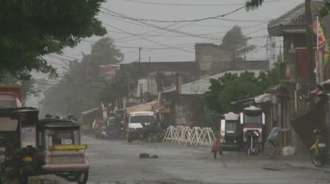 Hurricane Winds Blow Debris Through Streets Of Town Stock Footage 8997962