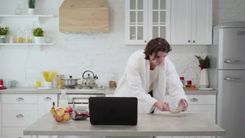 Hurrying young man running in kitchen, eating morning cereals with milk Stock Footage 150442824