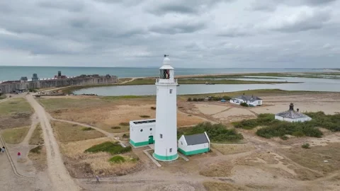 Hurst Point Lighthouse and Hurst Castle from drone over Hurst Spit, Milford on Stock Footage 333532066