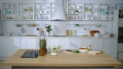 Husband sneaked into the kitchen and eats salad Stock-Footage 127287249
