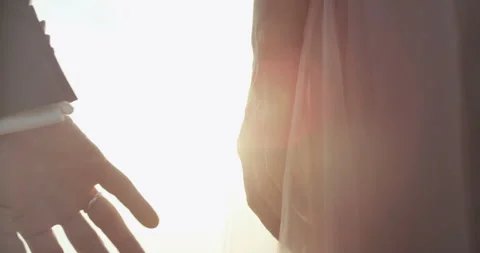 Husband is taking her wife's hand. Stock Footage 98749976