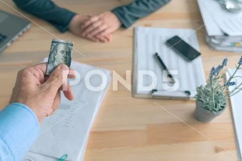 Hush money for paying off bribery to introduce business corruption Stock Photos