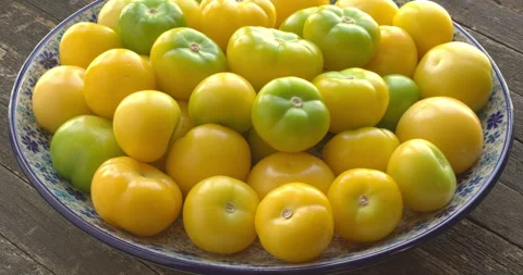 Husked, ripe tomatillo. Seamless loop. Stock Footage 277609944