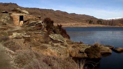 Hut Explosives Lake 01 Stock Footage