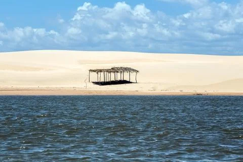 A hut lost between the sky and the sea Stock Photos