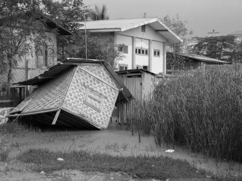 HUT SUBMERGED IN MUD Stock Photos