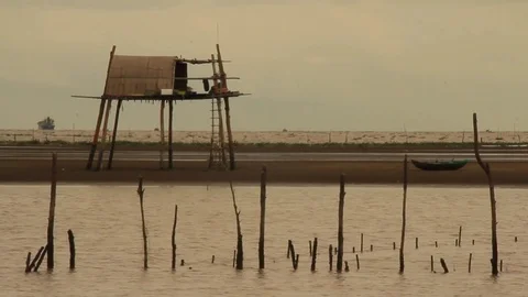 Huts of fishermen at sea Stock Footage