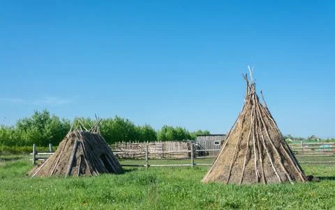 Huts made of hay. Stock Photos