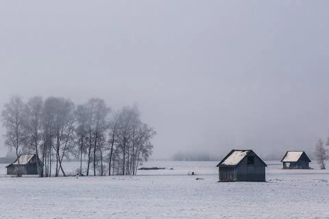 Huts in winter Stock Photos
