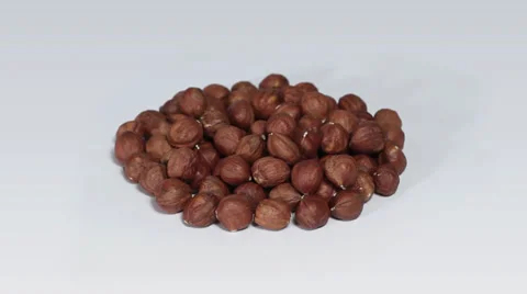 Huzelnuts on white turning close up Stock Footage 33731928