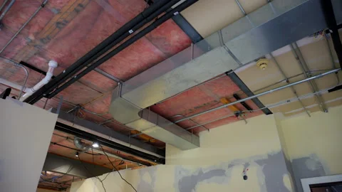 Hvac heating, air ventilation, air conditioning systems under ceiling in empty Stock Footage 320578777