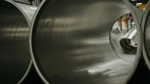 HVAC heating and cooling piping laying on the ground of a warehouse Stock Footage 201403438