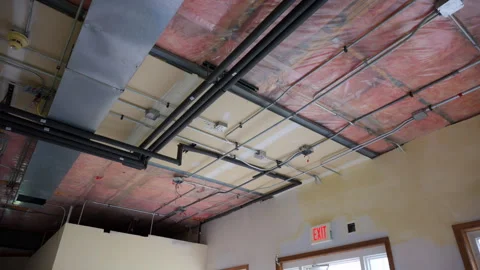 Hvac heating, ventilation, air conditioning systems under ceiling in empty room Stock Footage 320920518