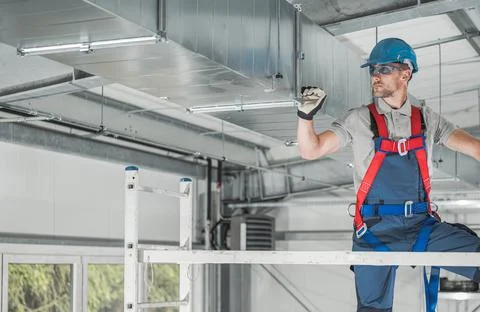 HVAC Professional Worker Checking Last Points of the System Stock Photos