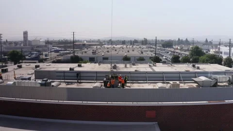 HVAC Rooftop Installation at Commercial Building Stock Footage 346849877