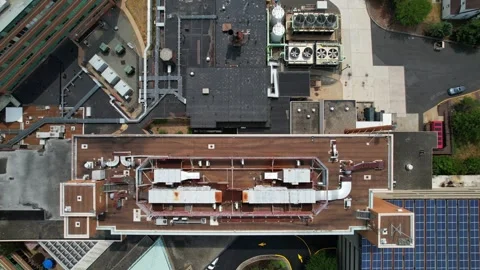 HVAC Systems running on Commercial Rooftop 4K Stock Footage 244247202