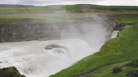 Hvatn river plunging over Gullfoss or Golden Falls Stock Footage 44786941