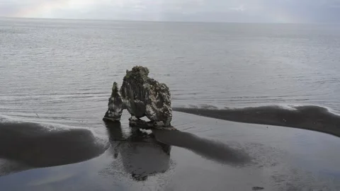 Hvitserkur Sea Stack on Black Sand Beach in Iceland 4K Nature Footage Stock Footage 339799605