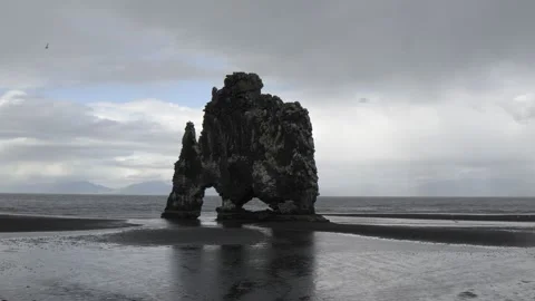 Hvitserkur Sea Stack on Rainy Icelandic Coastline 4K Nature Footage Stock Footage 339798352