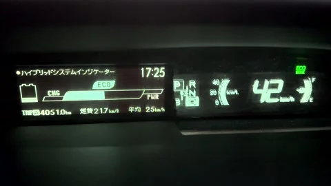 Hybrid car dashboard display with information about energy flow. Hybrid car.. Stock Footage 300766960