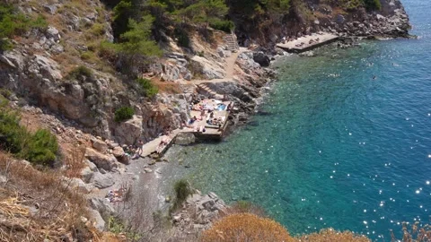 Hydra, Greece Beach. Close Up Beautiful Aegean Sea Waters Deep Blue Color S.. Stock Footage 336594558