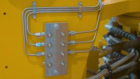 Hydraulic adjustment blocks in the system with stainless steel pipes Video stock 330901993