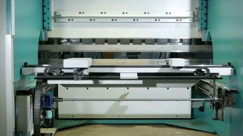 Hydraulic bending machine CNC. Back view. Move the various parts of the Video stock 71655062