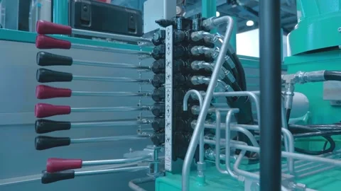 Hydraulic control unit with multiple levers on a truck lift at an exhibition Video stock 333321833
