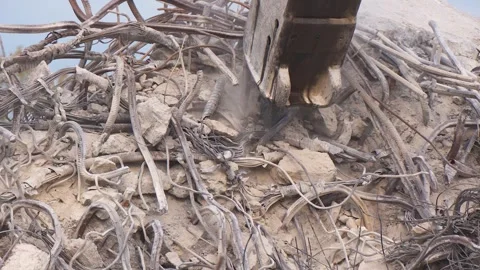 Hydraulic Crusher Breaking Concrete and Steel Reinforcement Stock-Footage 344583167