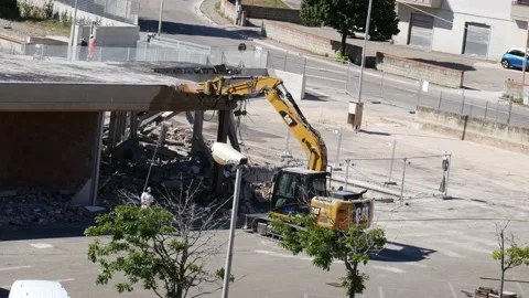 Hydraulic demolition hammer at work on a construction site Video stock 195118837