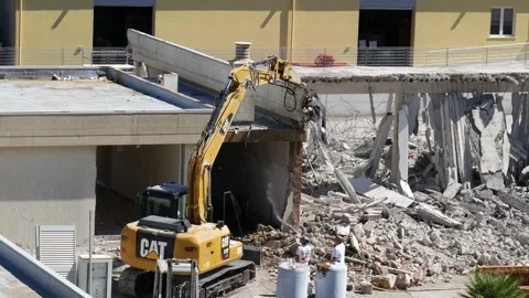 Hydraulic demolition hammer at work on a construction site. 1 Stock-Footage 195119127