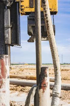 Hydraulic drilling machine at the construction site. Pile field. Photos