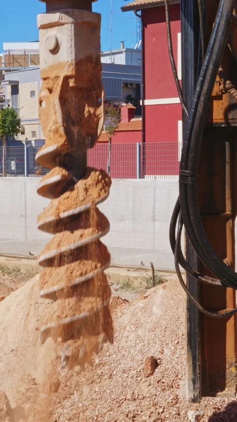 Hydraulic drilling rig for Installing a bored piles with a casing string on a Stock-Footage 293081255