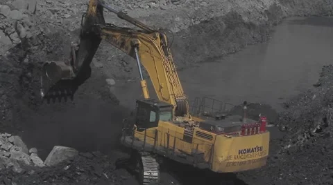 Hydraulic excavator digs coal in open pit Stock Footage 45807859