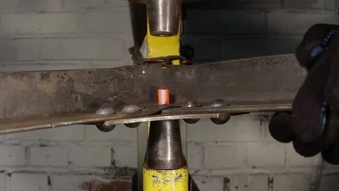 Hydraulic hot riveting. Stock Footage 137853630