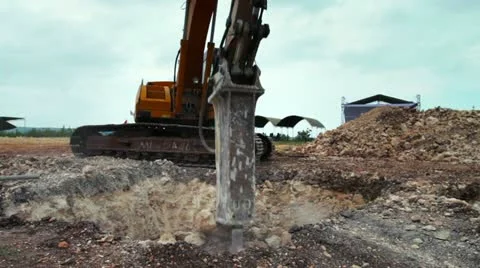 Hydraulic jackhammer on excavator at work Stock Footage 21537366