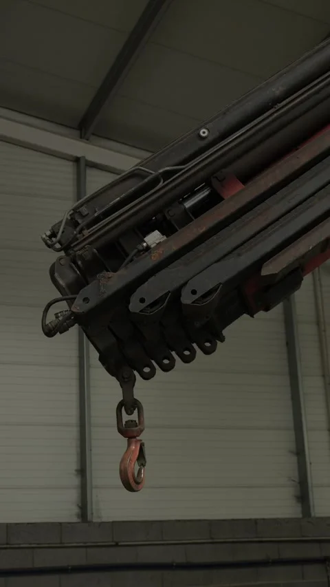 Hydraulic Knuckle Boom Crane Arm With Hook Inside Industrial Workshop Stock Footage 337913387