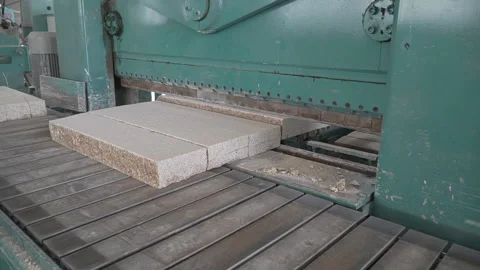 Hydraulic pressure machine cutting granite Stock Footage 237340415