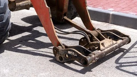 Hydraulic Quick Coupler of Excavator at Road Construction Site Фото