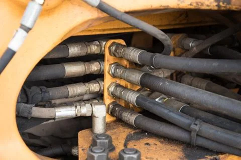 Hydraulic system of the tractor, close-up. Background, texture. Device of the Stock Photos