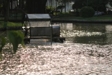 Hydraulic turbine engine technology working water beautiful light in the even Foto stock