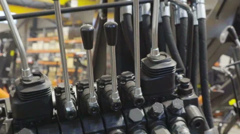 The hydraulic valve hoses of the machine Stock Footage 62957865