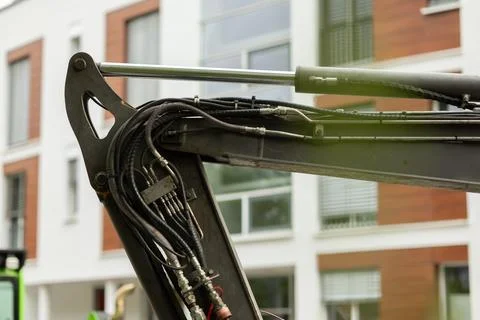 Hydraulics. Hydraulic system components of an excavator with visible hoses .. Stock Photos