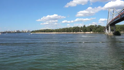 Hydro-cycle pass under the bridge on the Dnieper in 4K Stock Footage 137791749