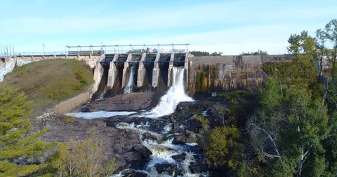 Hydro Electric dam holding back the reservoir Stock Footage 98914197