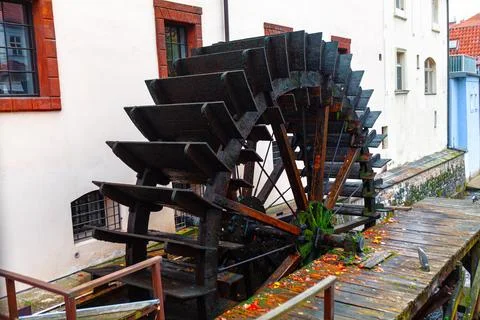 Hydro powered river wheel Stock Photos