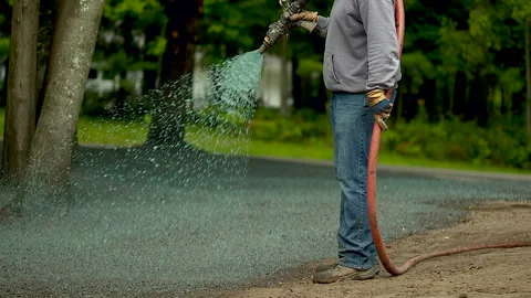 Hydro Seed Application Man Spraying 01 Stock Footage 164871609